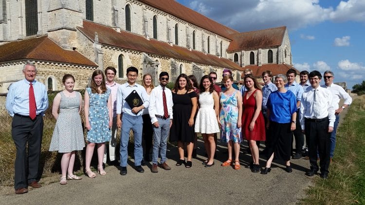 The Choir whilst on tour in France, outside Pontigny Abbey