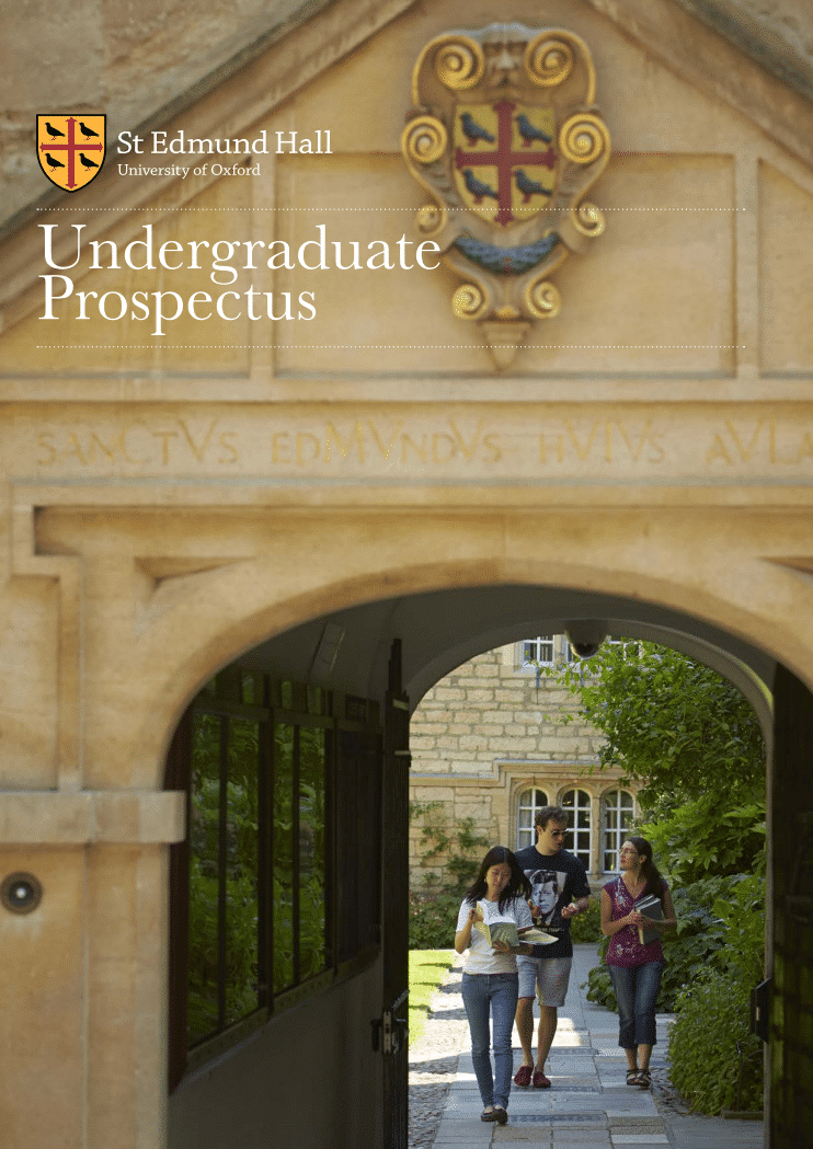 The front cover of the 2020 college prospectus. A full cover photograph of the entrance archway of St Edmund Hall, with two students walking towards us in the distance.