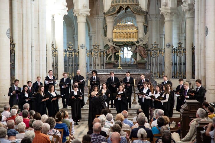 Choir of St Edmund Hall performing at Pontigny Abbey.