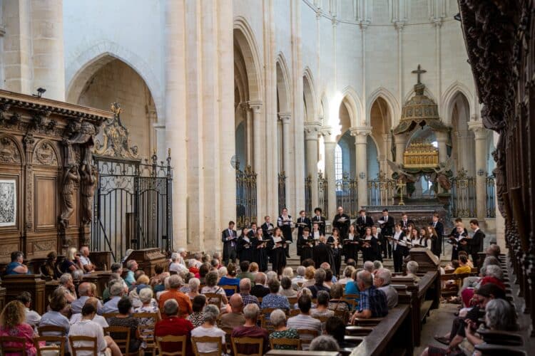 Choir of St Edmund Hall performing at Pontigny Abbey.