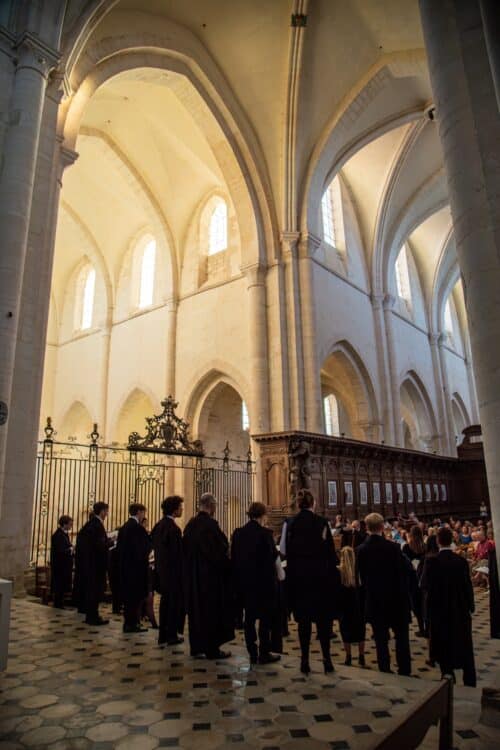 Choir of St Edmund Hall performing at Pontigny Abbey.