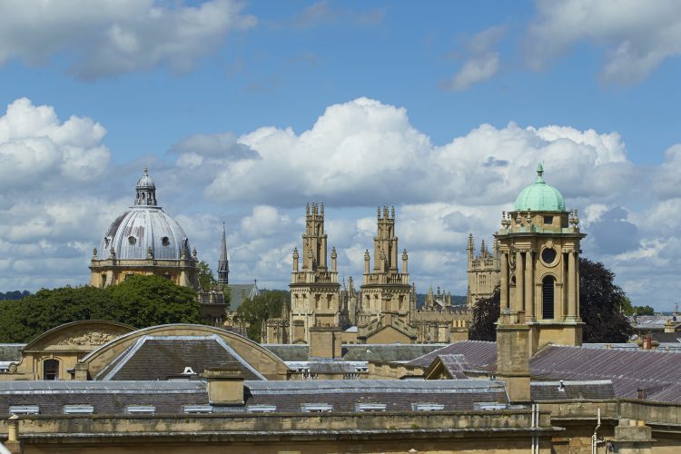 Books in the Old Library A grotesque of a former St Edmund Hall bursar, holding money bags Faces of Teddy Hall students The beautiful Oxford skyline taken from the roof of Teddy Hall