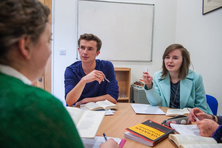 The Front Quad at St Edmund Hall Students in a Modern Languages tutorial with college lecturer Alex Lloyd
