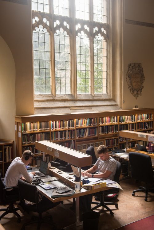 Students studying in the College library