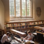 Two students studying in the Library