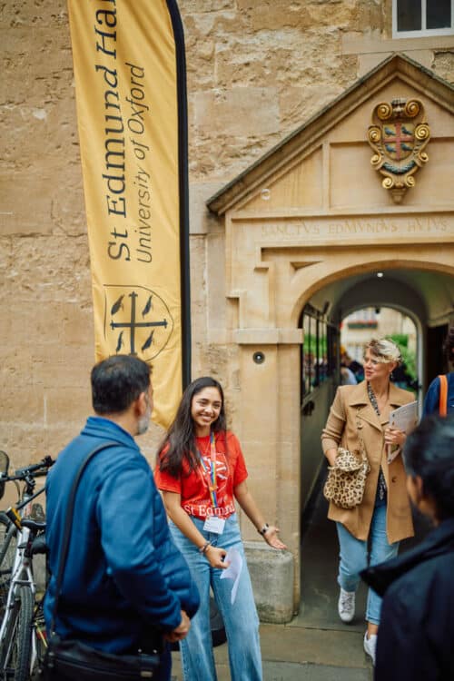 Student welcoming people to open day 2023