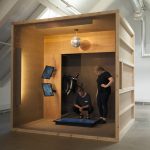 Alistair Debling, together with another Ruskin student, Harriet Boardman, inside his installation Defence Pavilion at the MFA Degree show