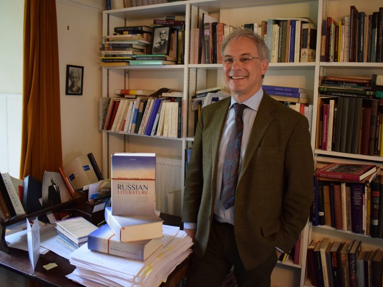 Professor Andrew Kahn, pictured with copies of 'A History of Russian Literature'