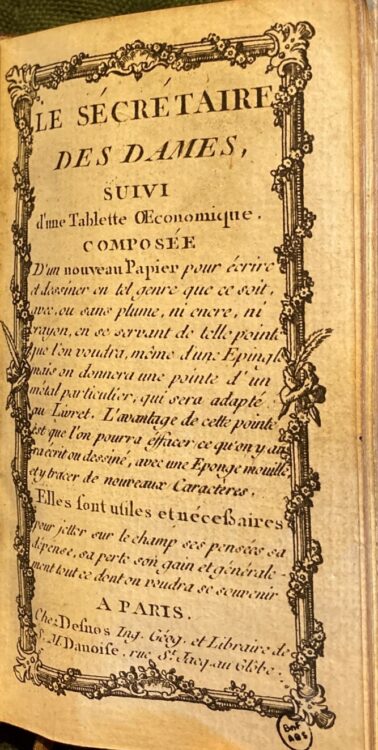 Binding and title page of 'Le Secrétaire des Dames' held in the Bibliothèque de l'Arsenal with a metal stylus that, with three leather loops, acts as a closure for the volume