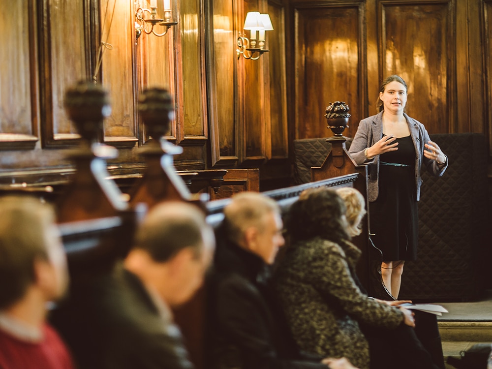 Charlie Stagg giving a talk in the College Chapel at the St Edmund Hall Research Expo