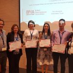 Charlie Stagg with the other Early Career Researcher Prize winners, and Prof. Illana Gozes, who awarded the prizes, and Prof. Hagai Bergman, President of ISFN
