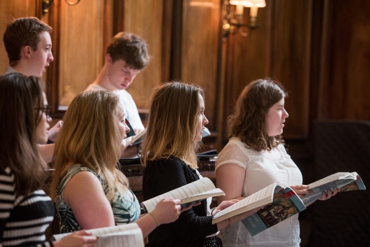 The choir rehearsing in the Teddy Hall Chapel