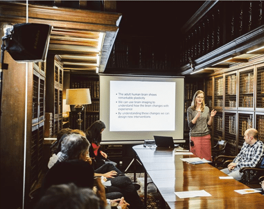 Image of Heidi giving a talk on brain change at St Edmund Halll