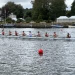 Students in a boat on the river Thames at Henley Town and Visitors Regatta