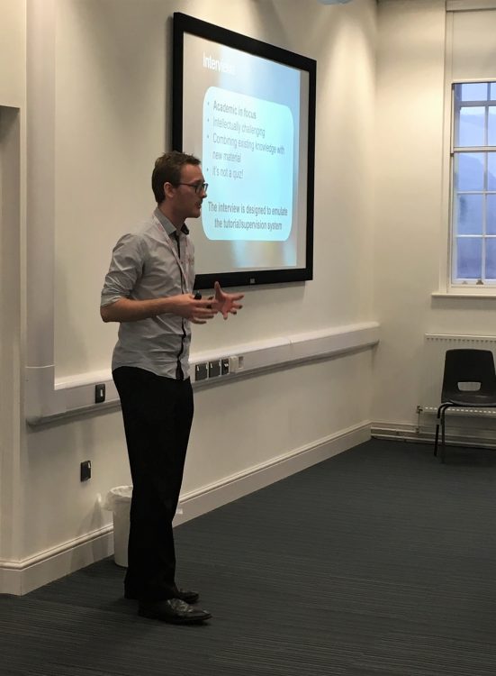 Schools Liaison Officer Luke Maw delivers a talk in collaboration with Amber Cuttill from Pembroke College Cambridge at Wyggeston and Queen Elizabeth College in Leicester