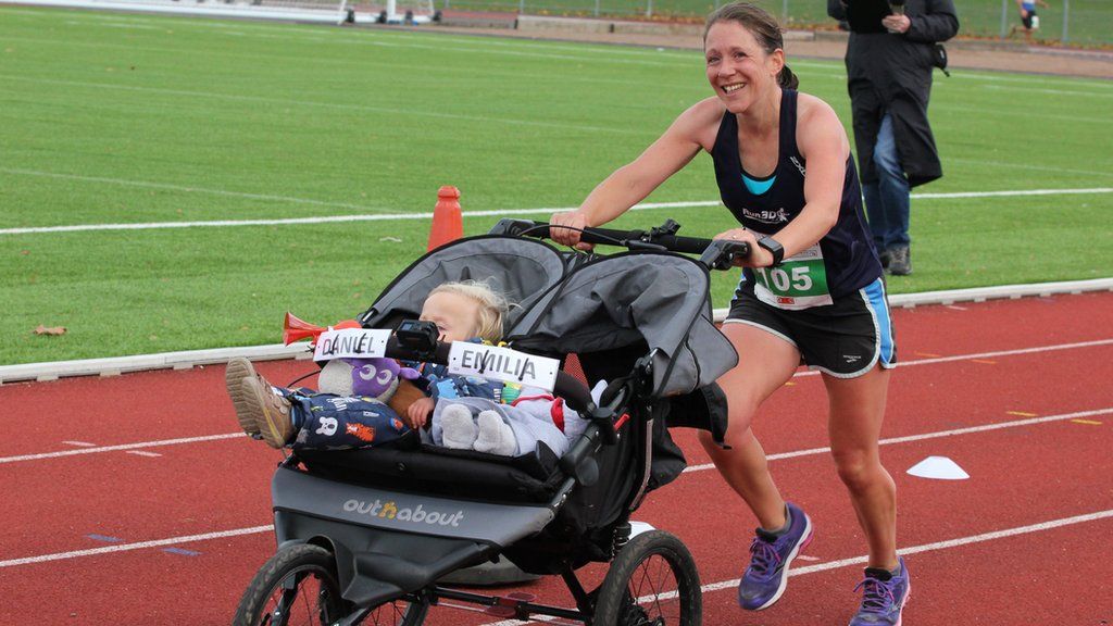 Jessica Bruce, running with her two young children in a buggy