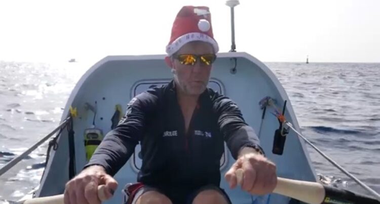 Jim enjoying Christmas Day on the high seas.