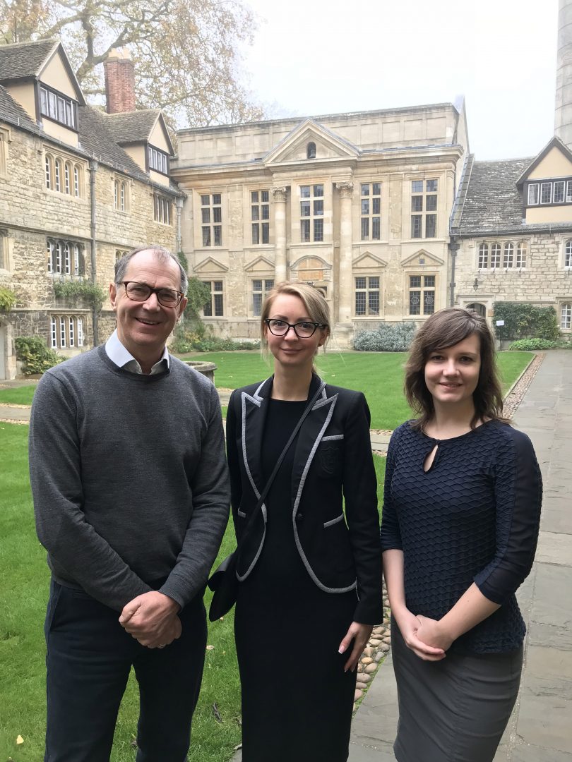 Keith Gull, Daryna Dvornichenko and Ilona Mostipan in St Edmund Hall's Front Quad