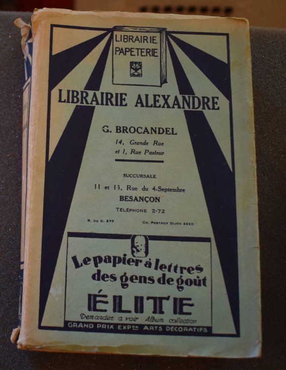 A copy of Le Feu by Henri Barbusse, in custom dust jacket of the book shop from which it was purchased in Besancon