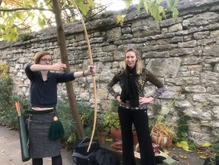 Linda Davies providing some longbow training for Helen Swift