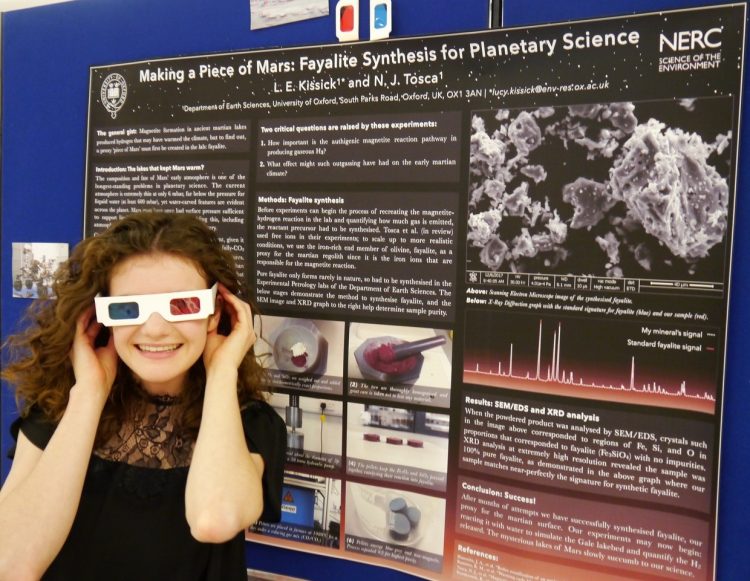 Postgraduate student Lucy Kissick with her research poster at the Oxford NERC DTP conference