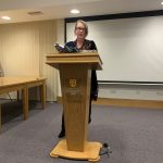 A E Stallings standing at Teddy Hall lectern