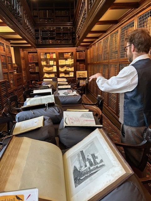 Old Library Exhibition A table with a display of old books from the collection at St Edmund Hall