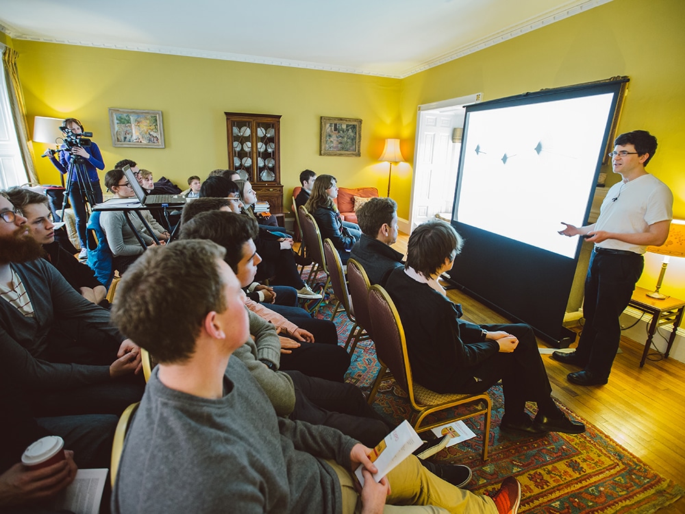 Oliver Riordan giving a talk at the St Edmund Hall Research Expo, in the Principal's Drawing Room