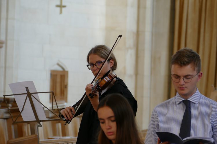 Violinist playing at Douai abbey