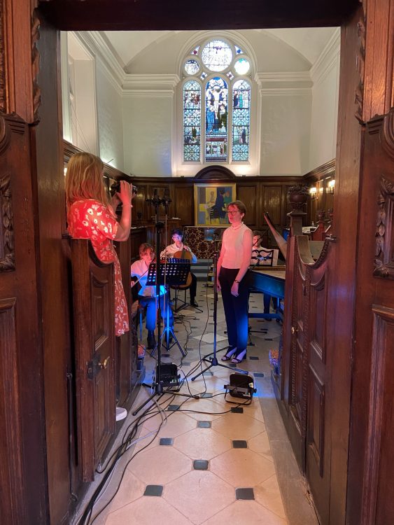 Students performing in the chapel for the Trinity Music Concert 2021