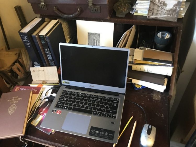 Laptop of college librarian in his home