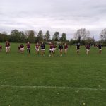 The men's rugby team warming up before the semi-final
