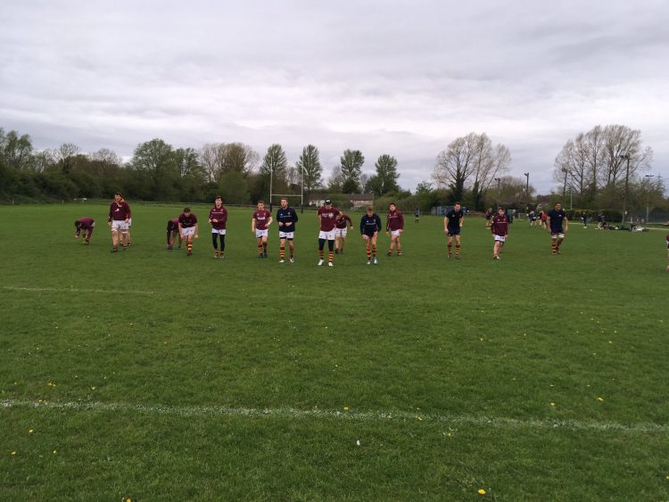 The men's rugby team warming up before the semi-final