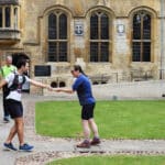 Running out of time relay two participants exchange the baton