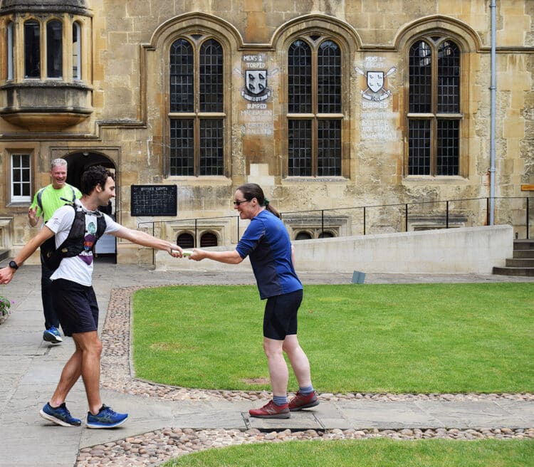 Running out of time relay two participants exchange the baton