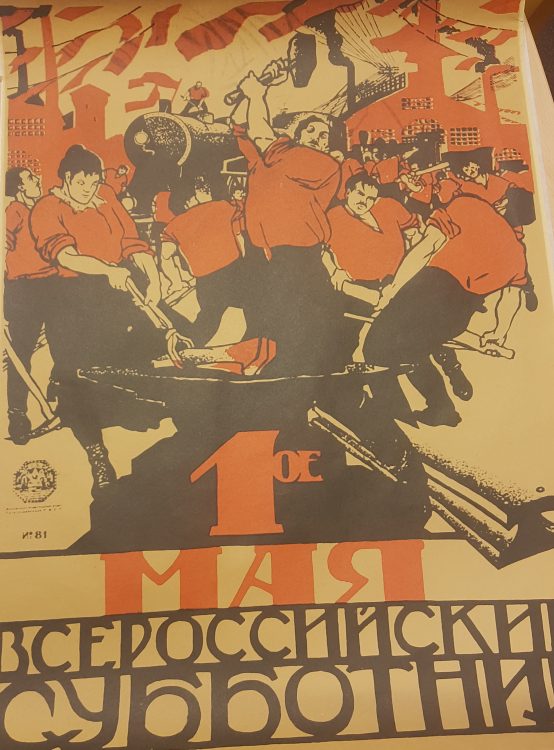Russian Revolution poster showing men and women forging a new reality
