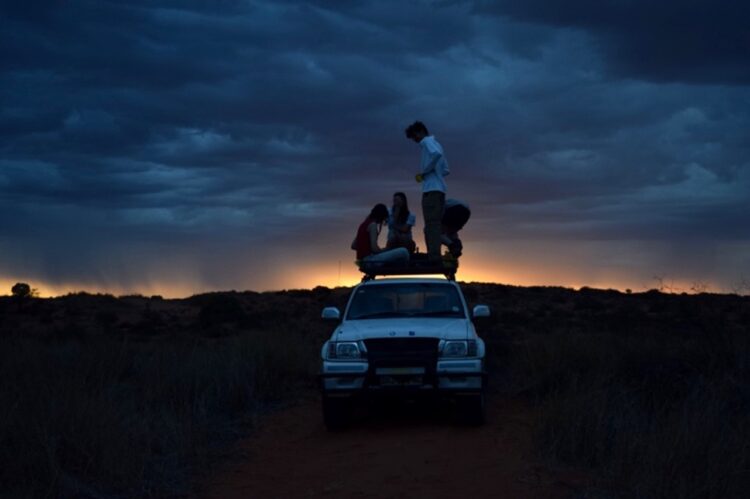 Second year SoGE undergraduates watch a storm roll in