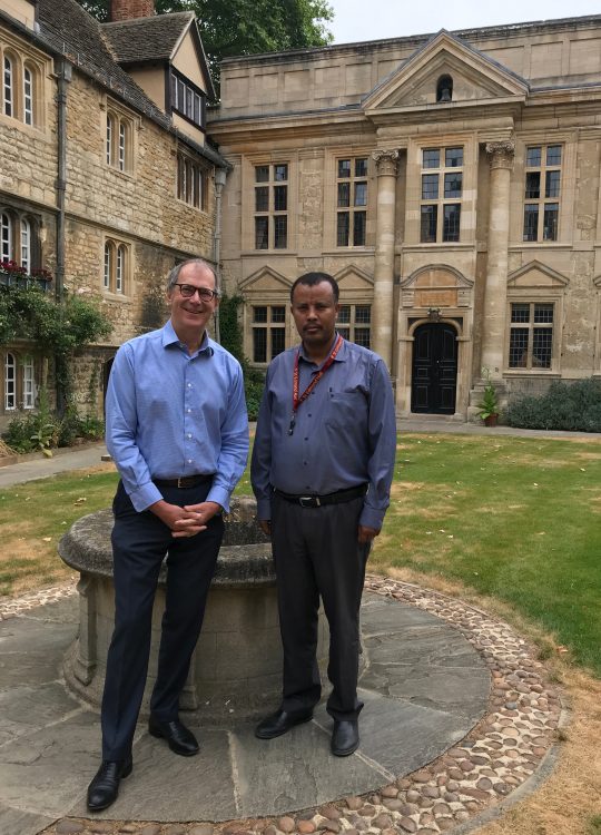 Dr Seifu Kebede-Gurmessa with Keith Gull in the Front Quad at St Edmund Hall