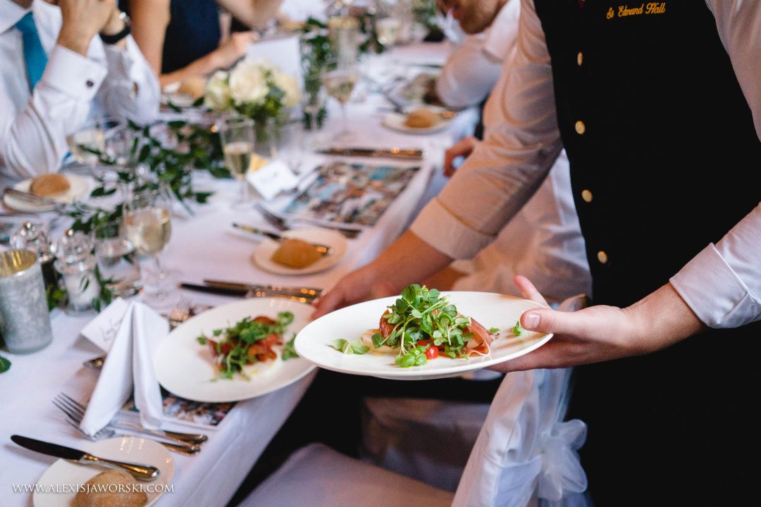 Food being served in the Old Dining Hall Food being served at a wedding at St Edmund Hall