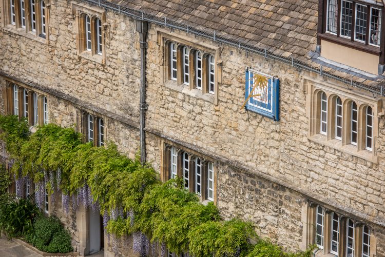 The sundial and wisteria in St Edmund Hall's Front Quad