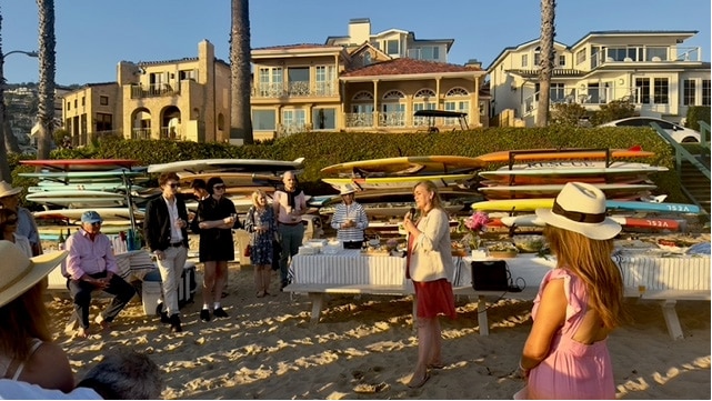 Principal speaking at Teddy Hall Laguna Beach Drinks