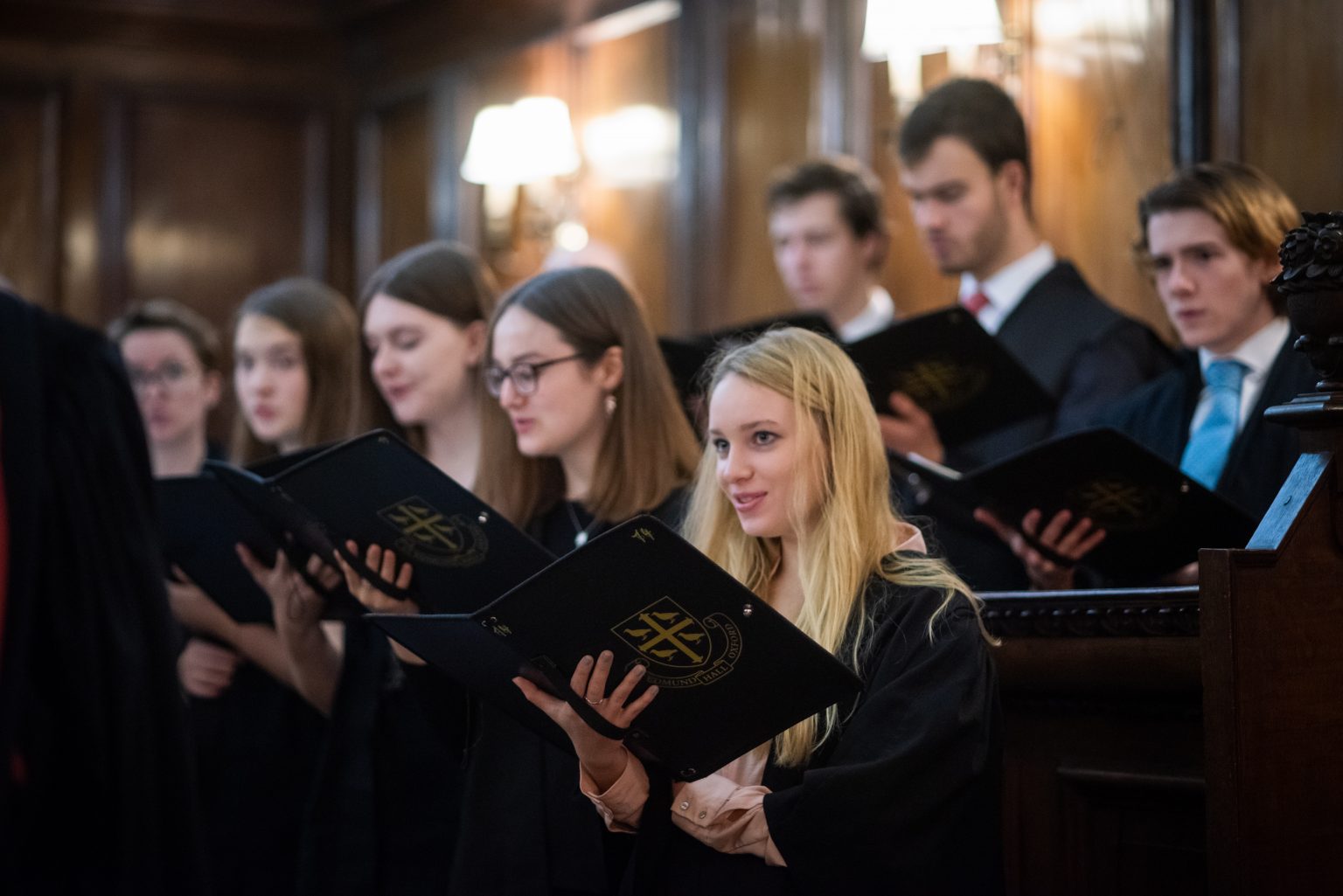 The choir singing in the St Edmund Hall Chapel