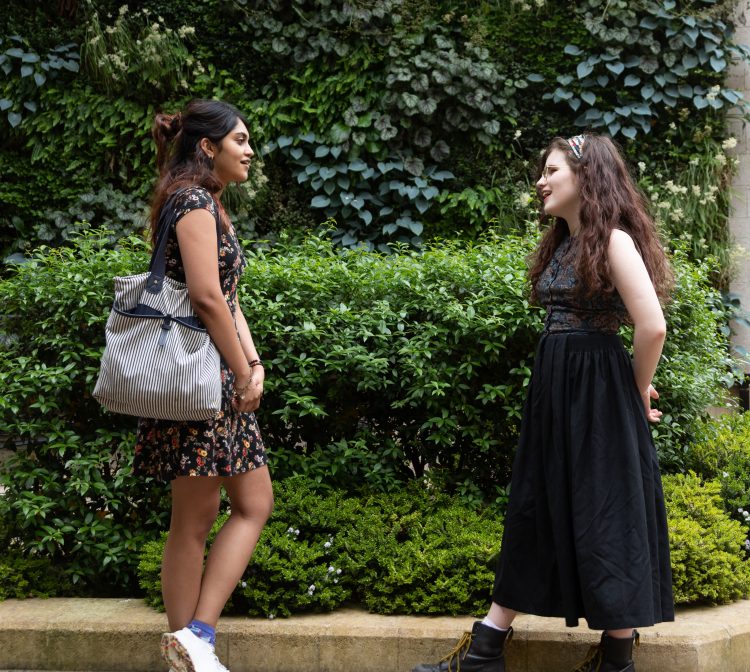 Two Teddy Hall students outside Green Wall in June 2021