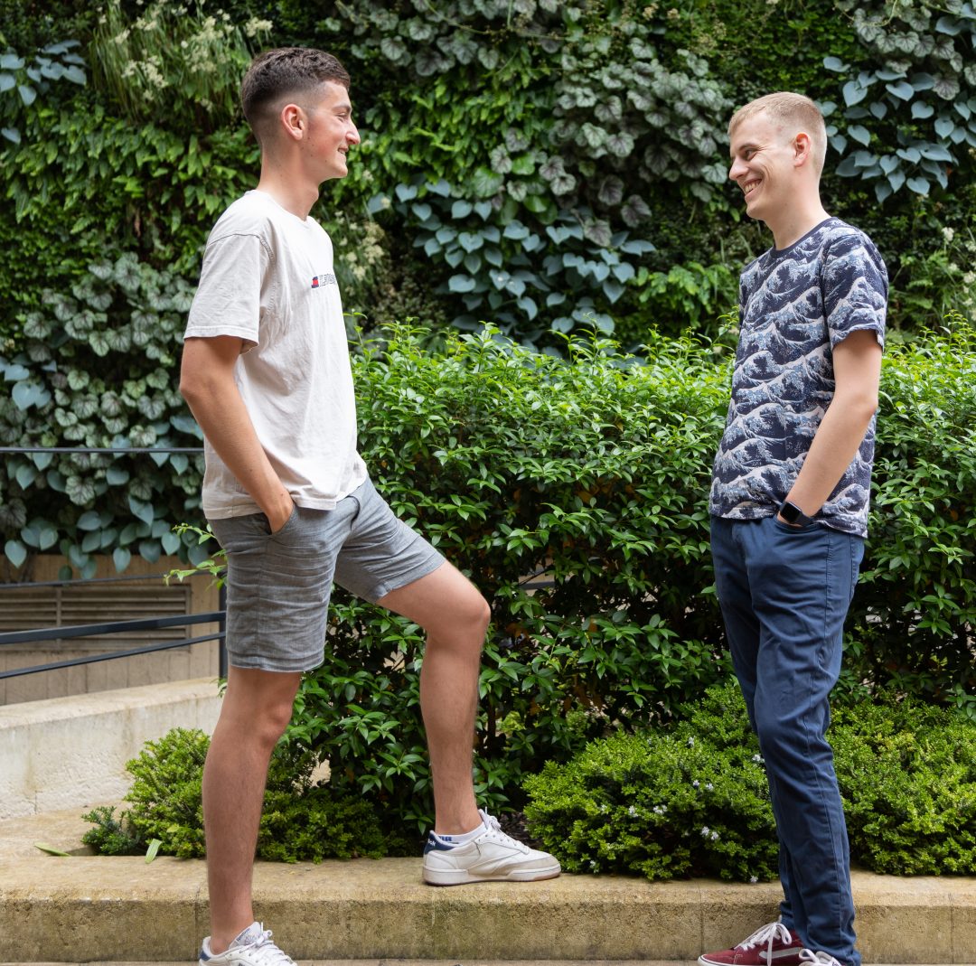 Two Teddy Hall students outside Green Wall in June 2021