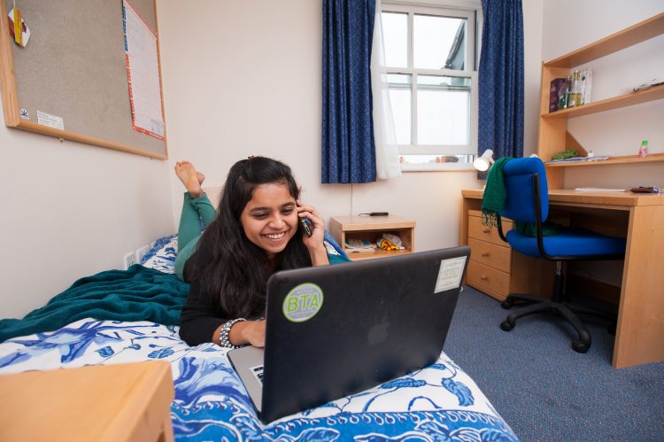 Visiting Student in her room in the William R Miller Annexe