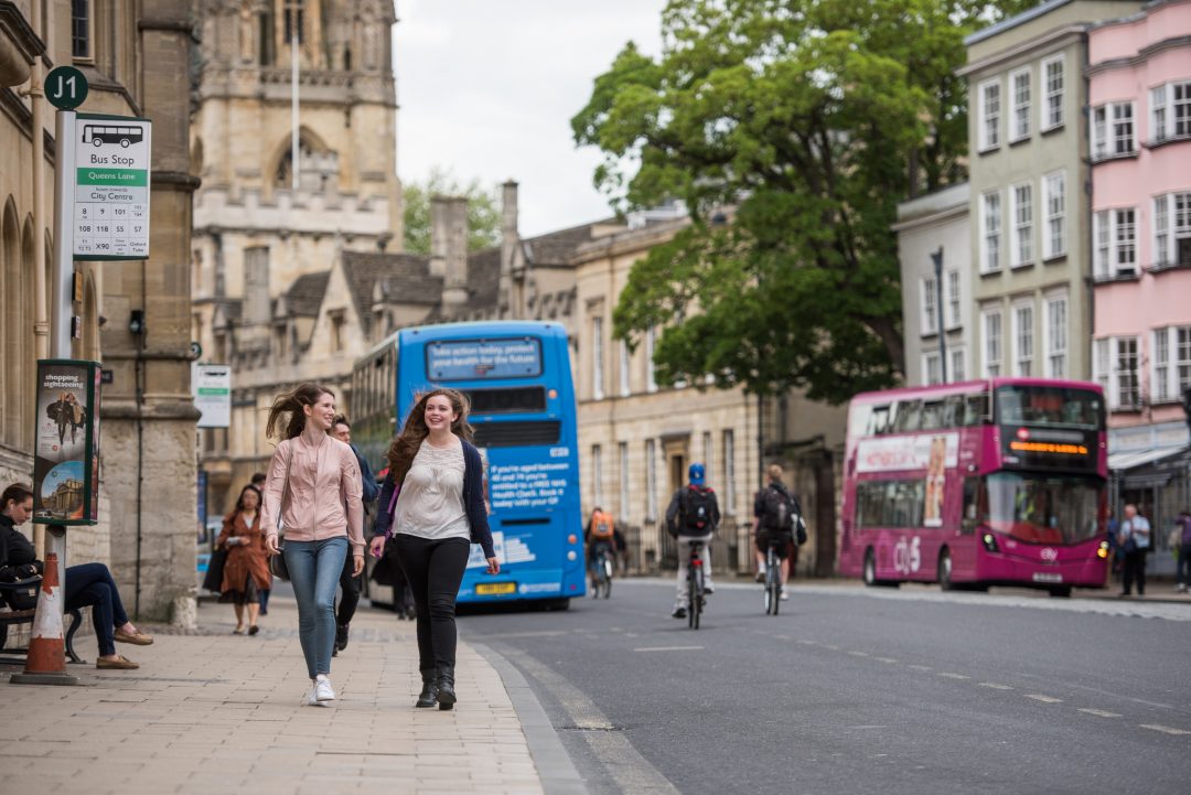 Visiting Students walking along Oxford's High Street, near St Edmund Hall