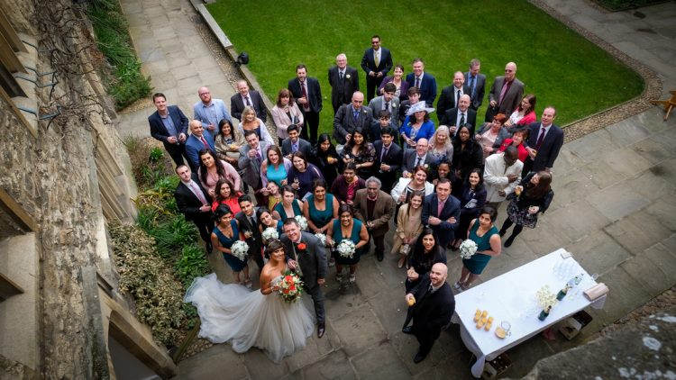 A wedding party in the College's Front Quad