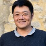 Headshot photo of Prof Wei Huang