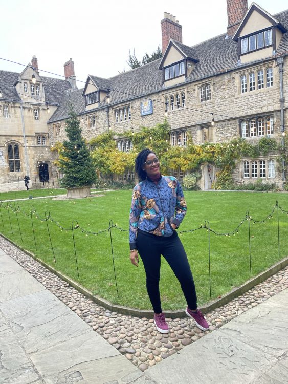Wilsona standing in the St Edmund Hall front quad.
